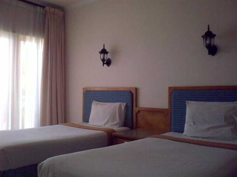 Pasific Beach Cottages Мангсит Экстерьер фото